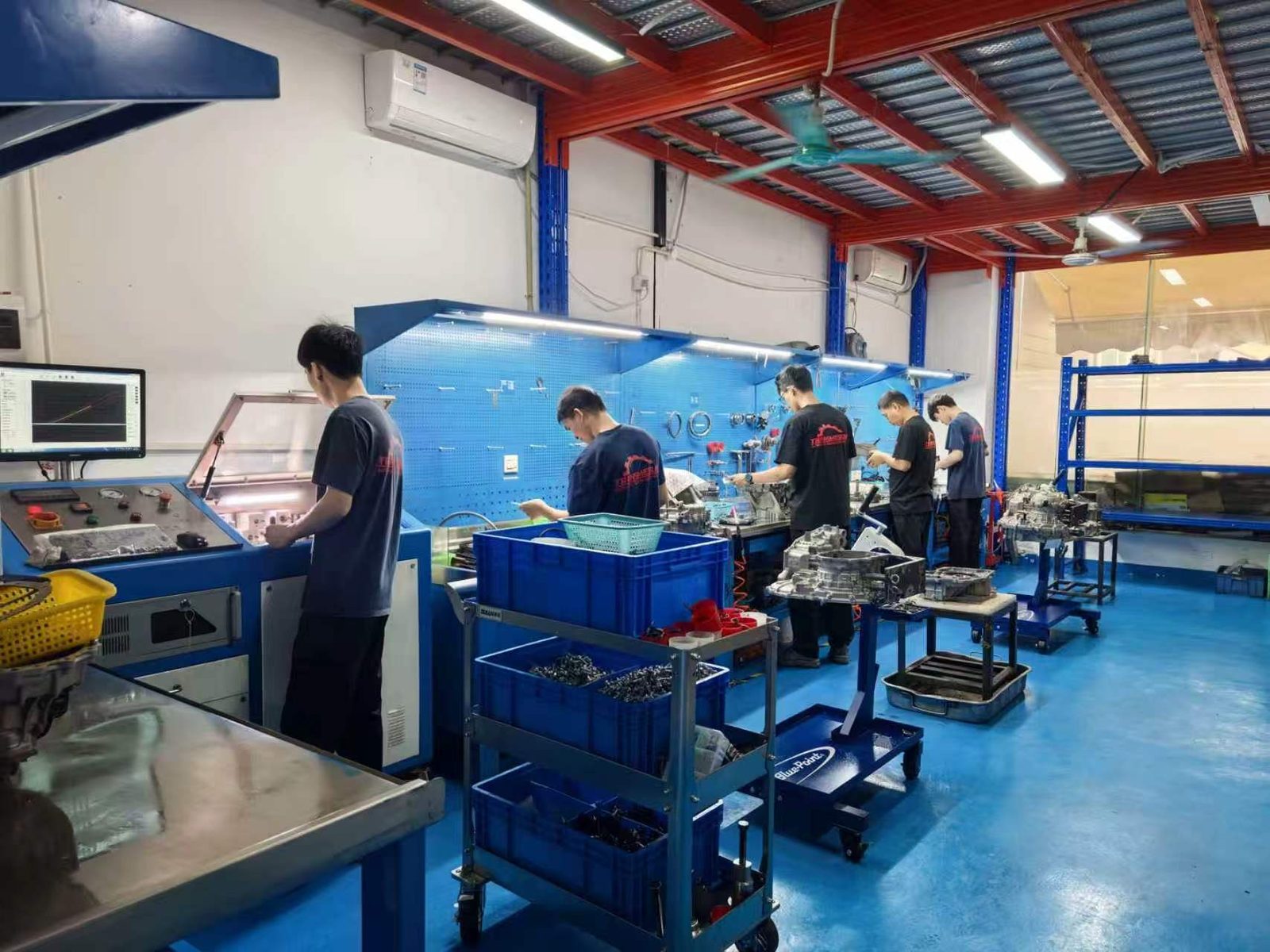 TRANSMESUN assembly hall with technicians at work
